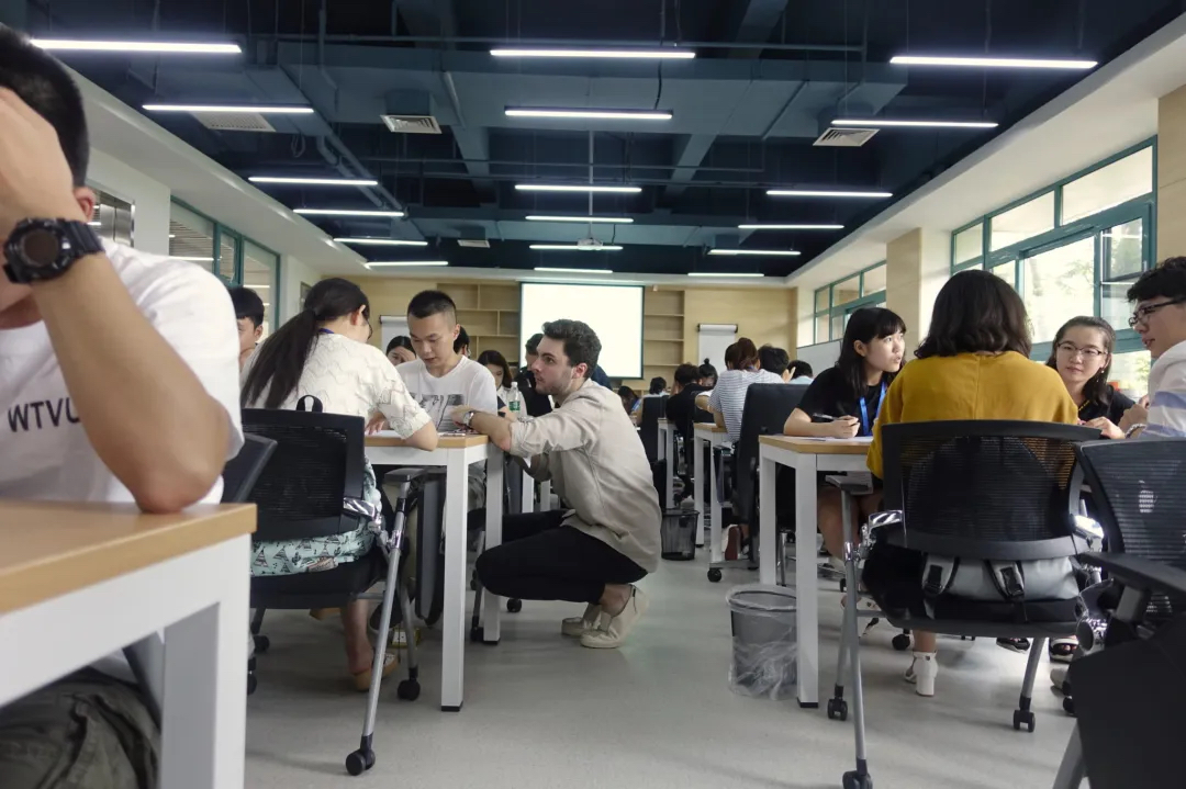 Greg working with participants at a workshop in Shenzhen